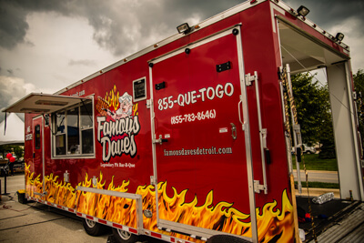Famous Dave's BBQ red food truck